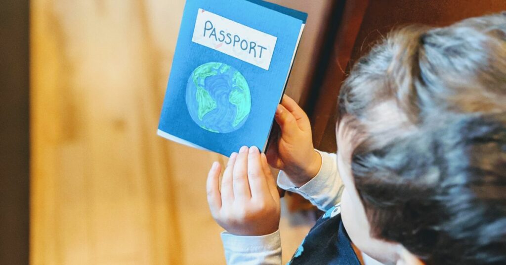 Child holding a homemade passport