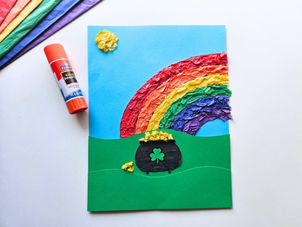 Place a tissue paper sun at the top of your pot of gold craft