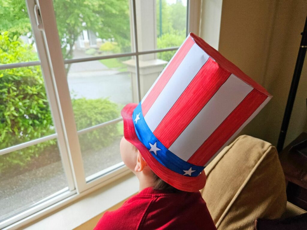 Child wearing an Uncle Sam hat craft