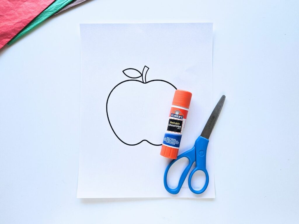 Materials to make an apple tissue paper craft