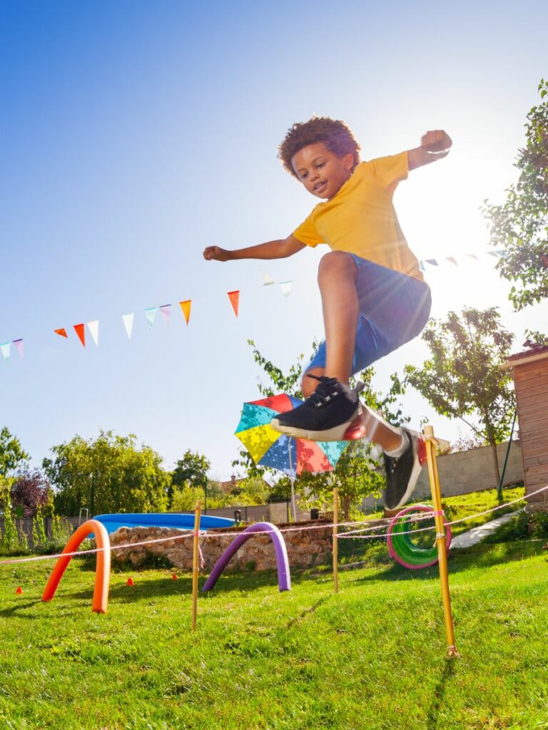 Child playing on an obstacle course