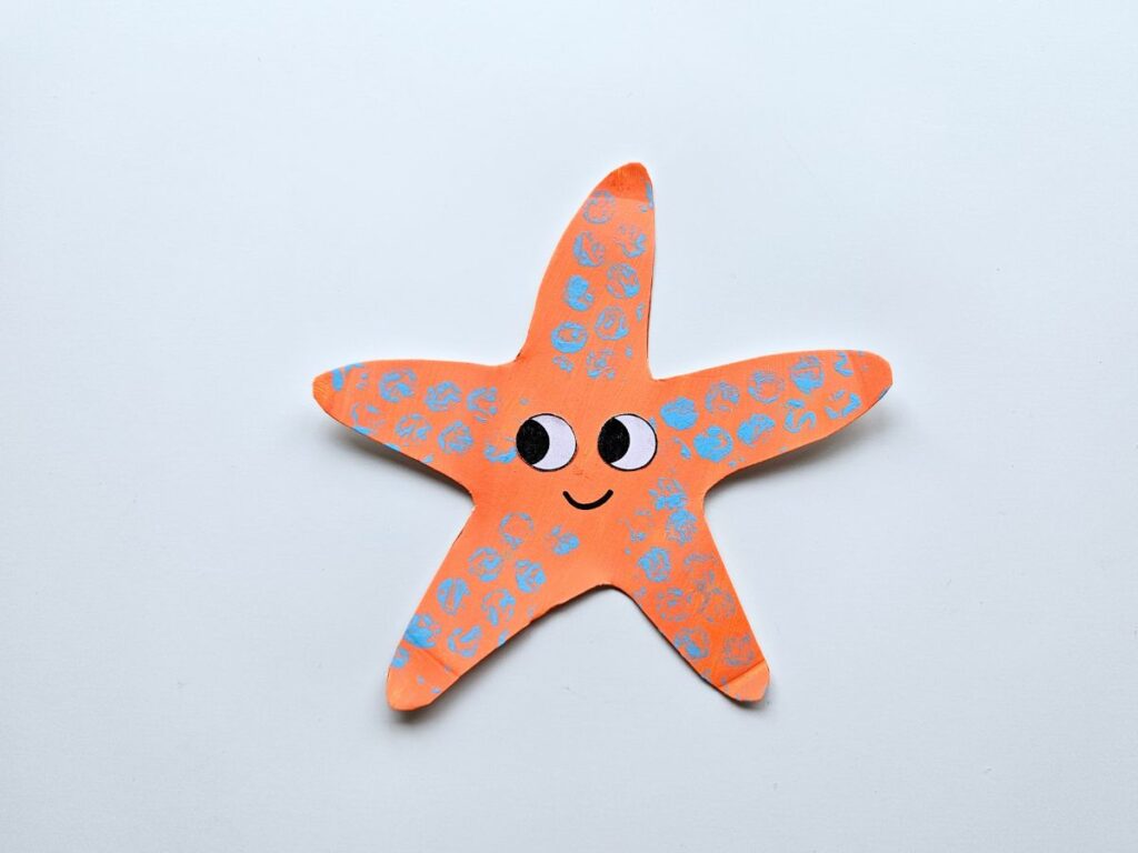 Completed starfish paper plate craft for kids