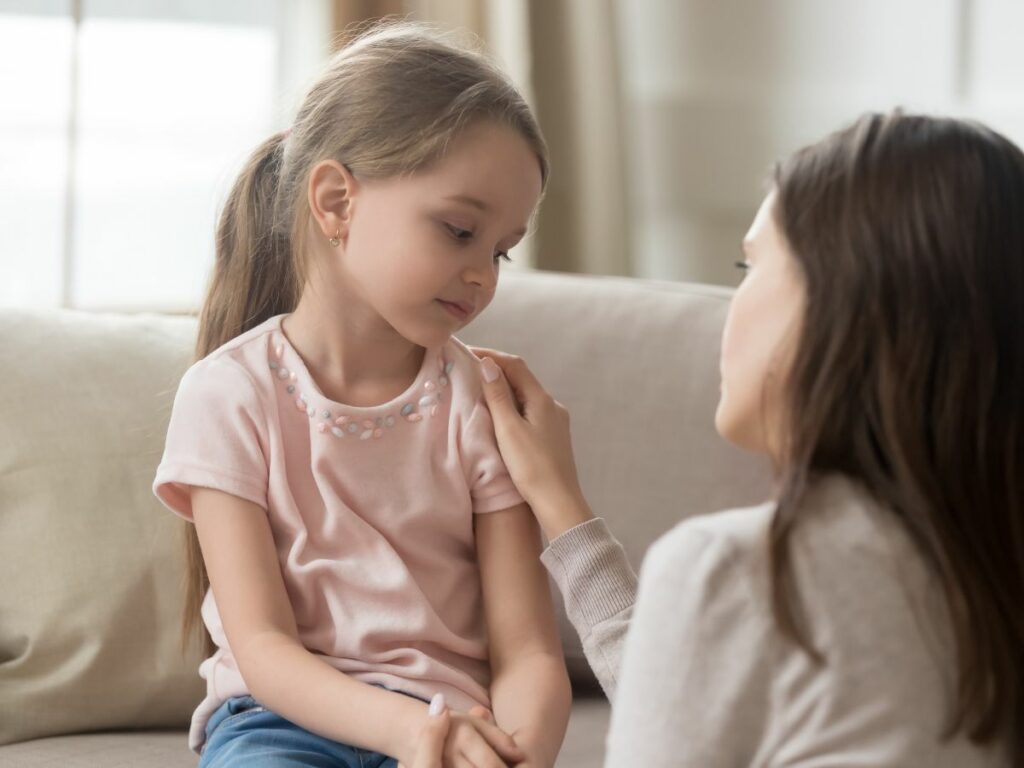 Mom talking to her daughter